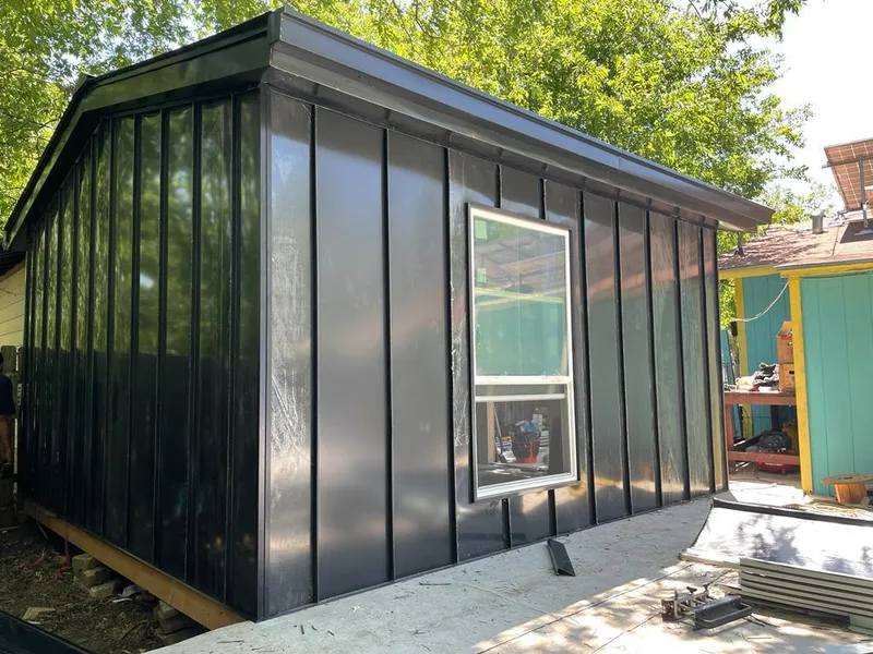 Black standing seam metal wall panels for Roof Inspection in Franklin